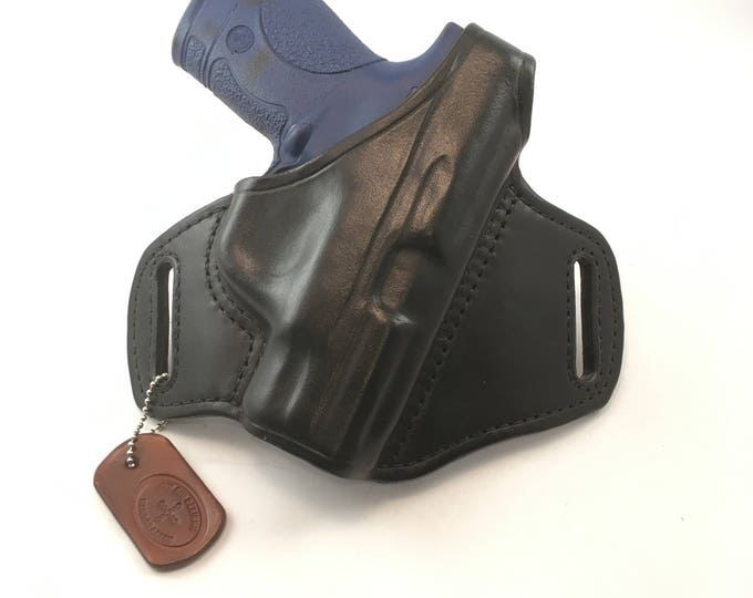 S & W MP Shield 40/9 with retention strap - Handcrafted Leather Pistol Holster