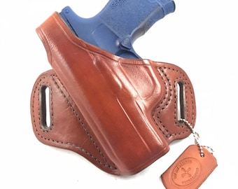 SIG p365 with retention strap - Handcrafted Leather Pistol Holster