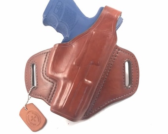 HK VP-9 SK with retention strap - Handcrafted Leather Pistol Holster