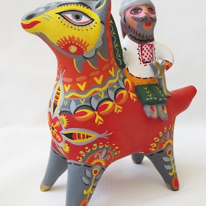 Skiff and his horse sunny - fantastic sculptures, ceramic whistles.