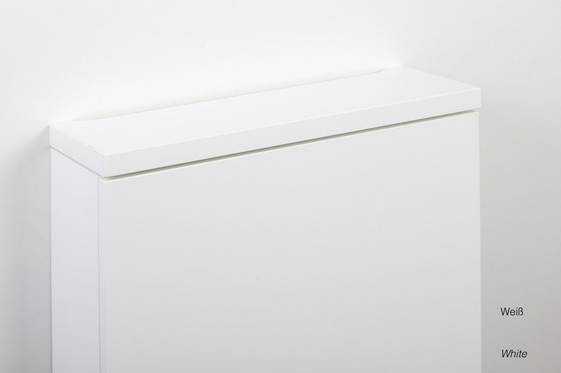 May include: White cabinet with a flat top and a white background.