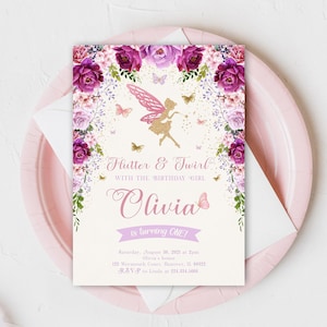 May include: A pink and purple floral invitation with a gold glitter fairy silhouette. The invitation says "Flutter & Twirl with the birthday girl Olivia is turning one!"  The invitation also includes the date, time, and location of the party.