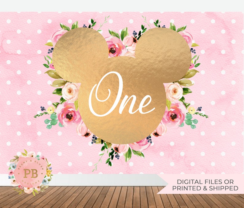 May include: Pink and white polka dot background with a gold Mickey Mouse head silhouette surrounded by pink and green watercolour flowers. The word "One" is written in white inside the Mickey Mouse head.