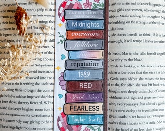 All 11 Tswift Albums as Books on Bookshelf Linen or Laminated Glossy Bookmark