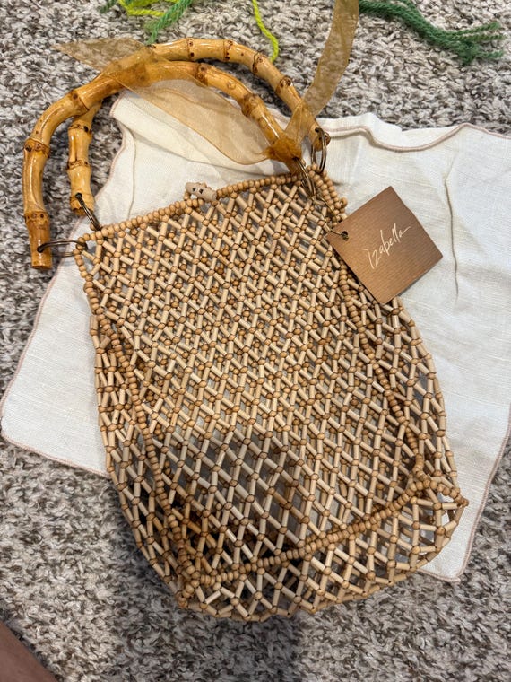 Vintage beaded purse with bamboo handles.