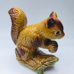 Vintage Squirrel Figurine Holding a Nut