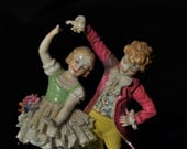 Dresden Volkstedt porcelain girl boy dancing figurine.