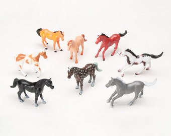 small plastic horses