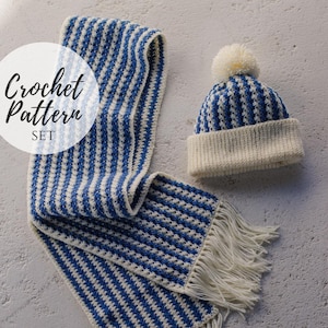 May include: A crochet pattern set featuring a blue and white striped scarf with fringe and a matching beanie with a white pom-pom. The text "Crochet Pattern SET" is in a white circle on the left.