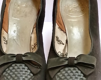 Black Vintage shoes. Suede, stilettos with  a little bow and woven pattern on the top of each shoe.  Lotus shoes.  US size 7.