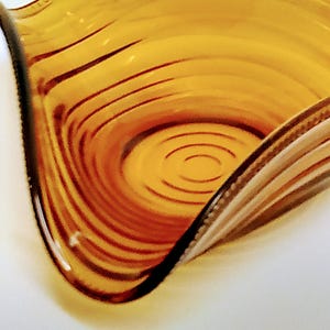 Vintage amber glass bowl. Triangular shaped.