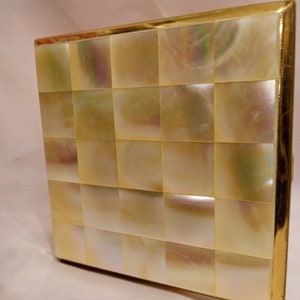 Vintage powder compact, mother of pearl and gold tone metal.