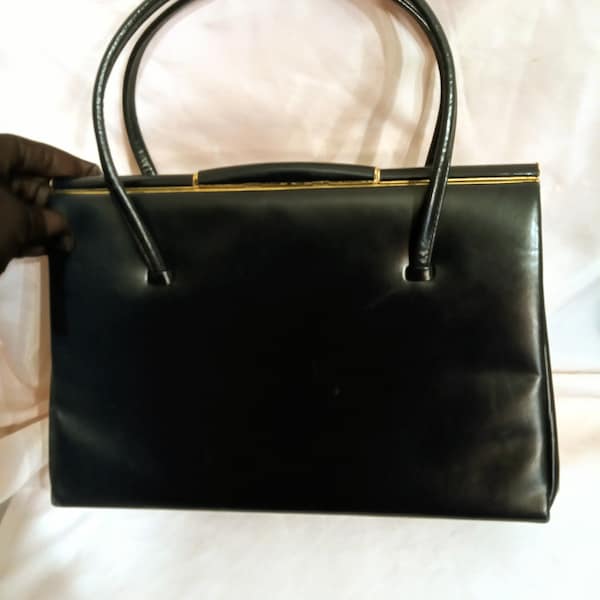 sac à main en cuir vintage. Sac à main Fassbender.  Fabriqué en Angleterre.