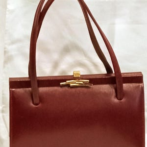 Vintage Ackerry Handtasche, mit Wildlederfutter.