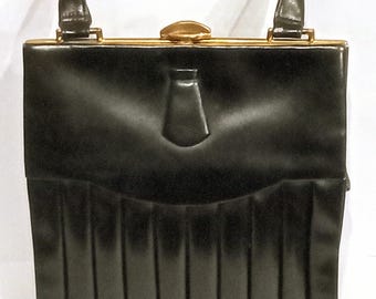 1940s Leather handbag.  With inbuilt swivel purse and mirror