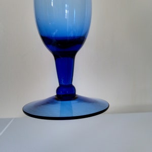 elegant and slim with frilled edges at the top of the vase. Pretty bud vase elegant and slim with frilled edges at the top of the vase. Pretty bud vase