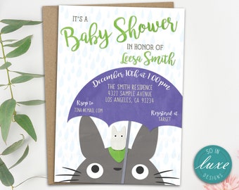 May include: Baby shower invitation featuring a gray cartoon character holding a purple umbrella with a white creature inside. The invitation includes the text "It's a Baby Shower" and event details. The design is set against a white background with blue raindrops.