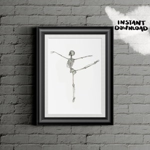May include: A black framed print of a skeleton in a ballet pose. The skeleton is in a white background.