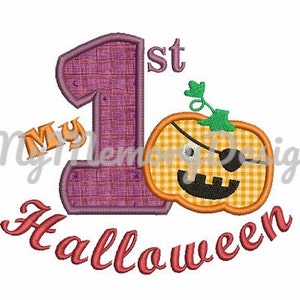 May include: Embroidered design featuring a purple number "1" with the word "My" in orange, the word "1st" in orange, the word "Halloween" in red, and a cartoon pumpkin with a pirate eye patch.