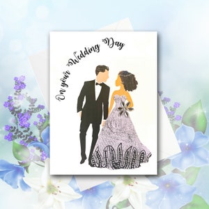 Wedding card showing white man with brunette hair and black woman with light brown skin and curly brown hair. Fabric dress is A- line shape.