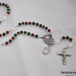Christmas Rosary With Snowflake, Red & Green Beads, Holy Family Nativity Centerpiece, and St. Nicholas Medal