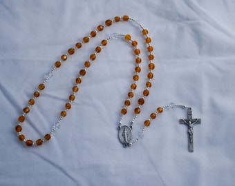 Lovely Amber and Clear White Glass Bead Rosary Featuring a Miraculous Medal Centerpiece and a Wood Grain Metal Crucifix