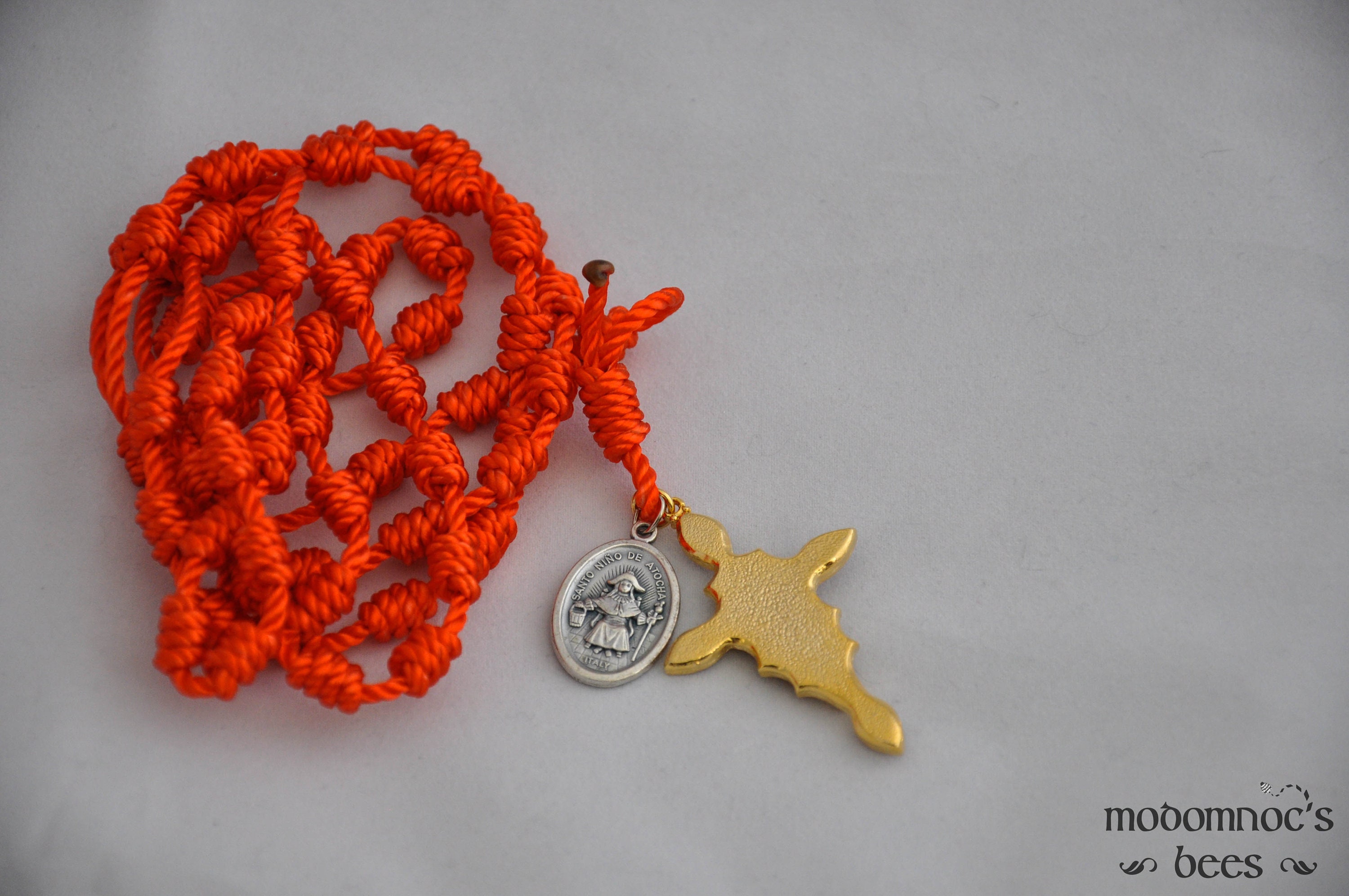 Orange Knotted Twine Spanish Rosary Featuring a Stained Glass Style
