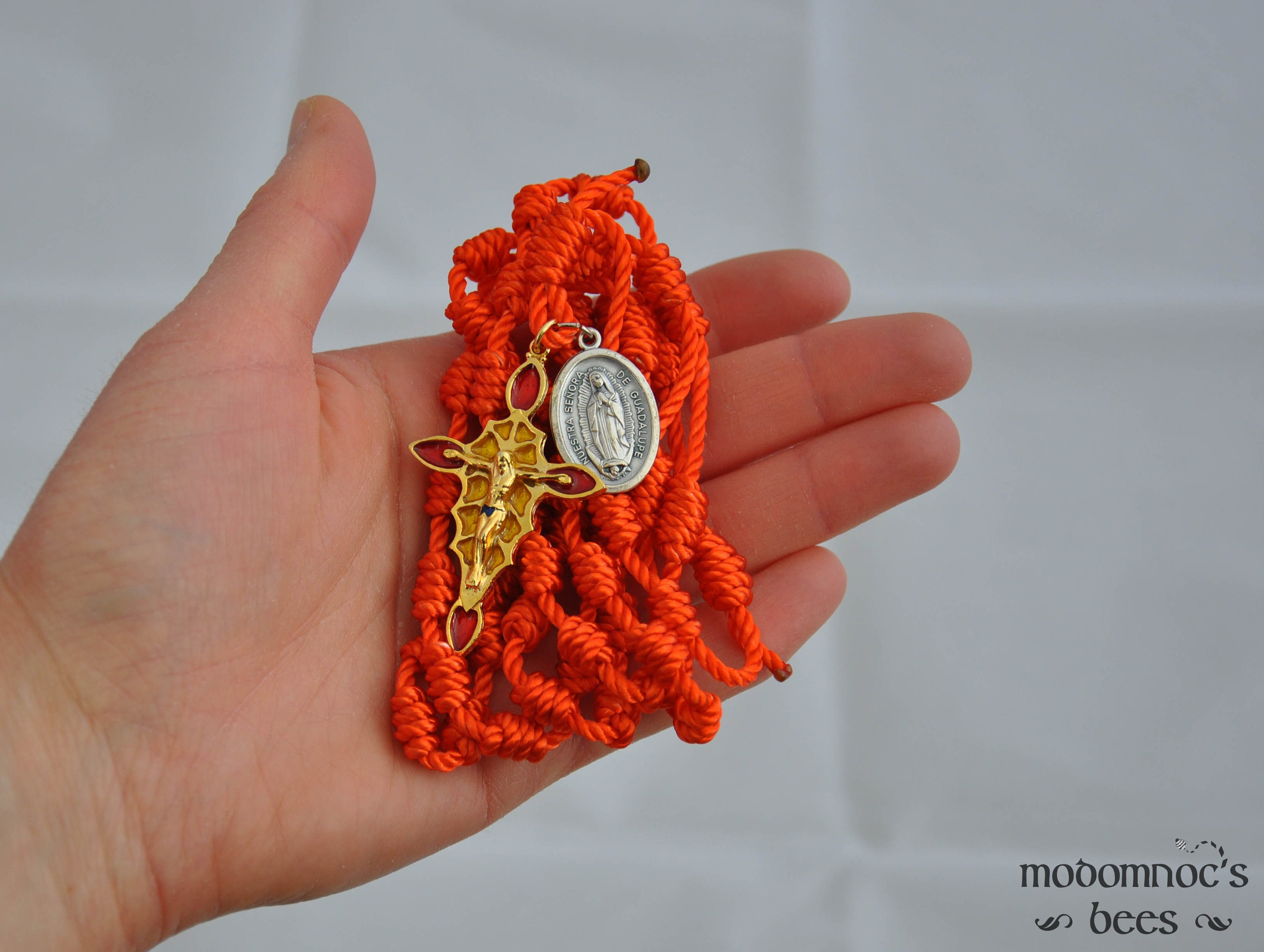 Orange Knotted Twine Spanish Rosary Featuring a Stained Glass Style