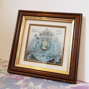 Vintage enamelled coin in wooden frame. Framed enamel English Stirling britannia coin. 1972 1997 25yrs coin wall hanging decor home gift.