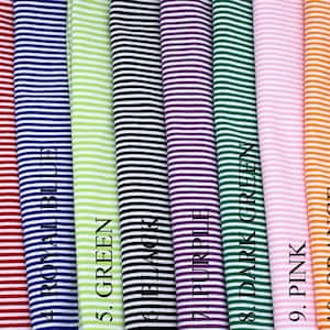 May include: Twelve fabric swatches with white stripes and different colored stripes. The colors are yellow, blue, red, royal blue, green, black, purple, dark green, pink, orange, brown, and hot pink.