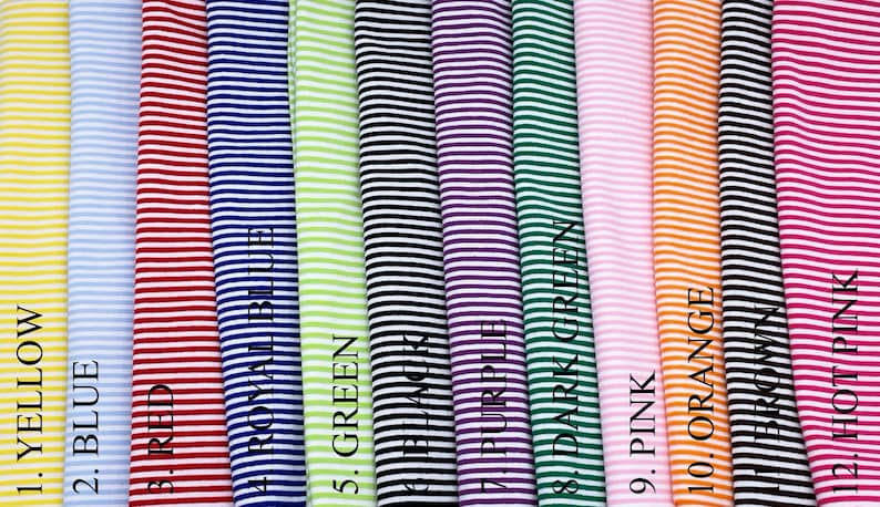 May include: Twelve fabric swatches with white stripes and different colored stripes. The colors are yellow, blue, red, royal blue, green, black, purple, dark green, pink, orange, brown, and hot pink.