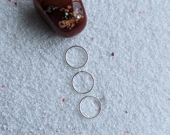 Genuine .925 Sterling Silver jump rings. Three pieces