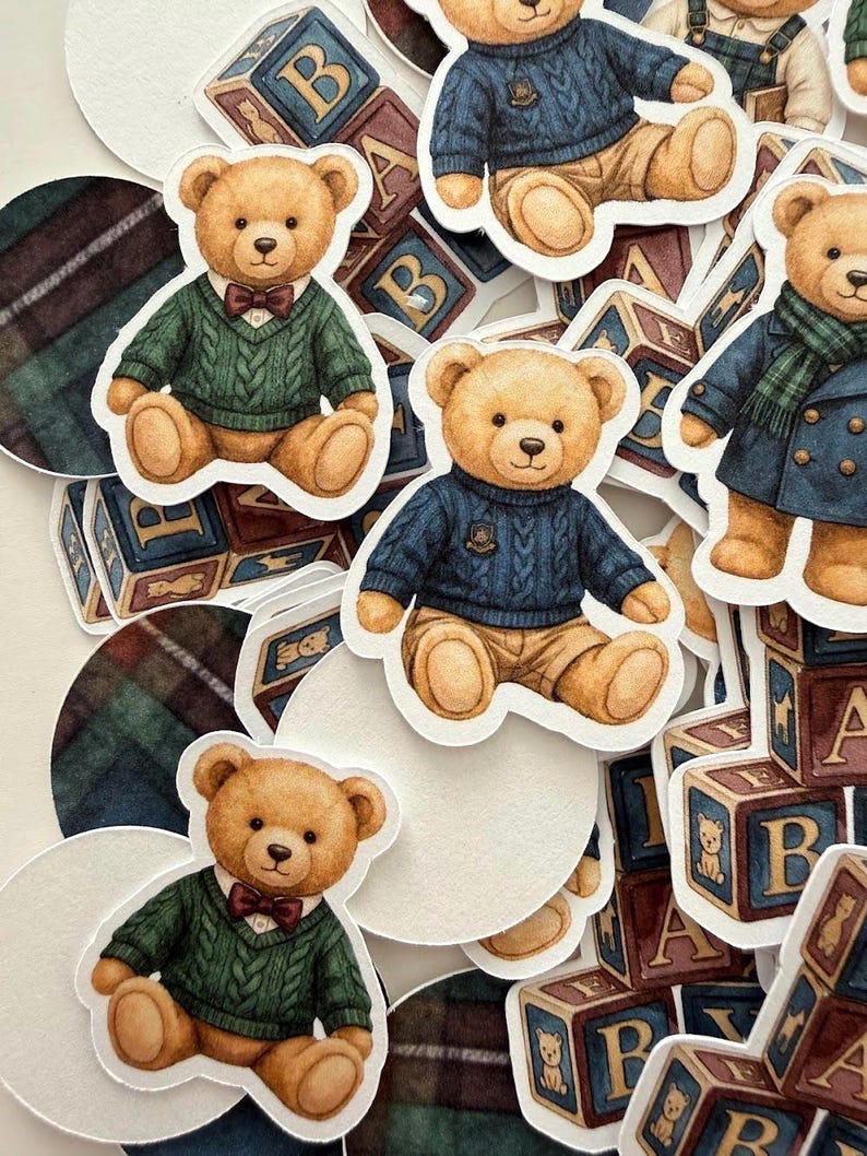May include: A collection of stickers featuring teddy bears in various outfits, including sweaters and coats. The bears are surrounded by alphabet blocks and plaid circles, creating a vintage, nostalgic aesthetic.