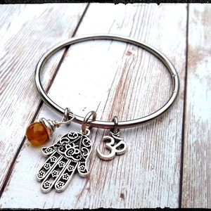 Hamsa Bracelet • Stainless Steel Band | Hamsa Hand Charm | Ohm Symbol | Birthstone Bead | Small Only Slip on Stainless Bangle | Yoga Gift