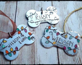 Pet Name Christmas Holiday Ornament • Hand Stamped Aluminum Bone | Christmas Lights/Paw print | Customize Your Own | Fur Mom/Dad Gift
