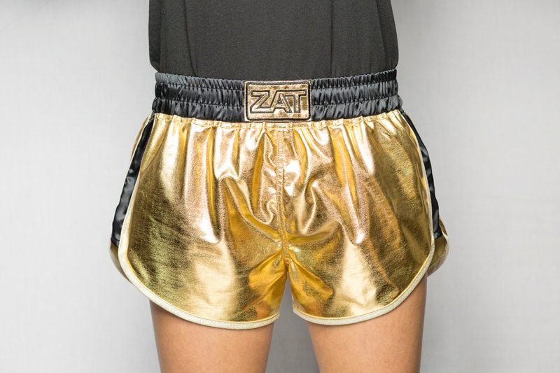 Shorts gold jersey coated laminate elastic belt and sides satin black bordered bias white gold ZAT GOLDEN BLACK T.L 40/42 made in France
