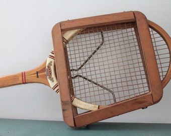 Vintage Dunlop wooden tennis racket with its wooden press
