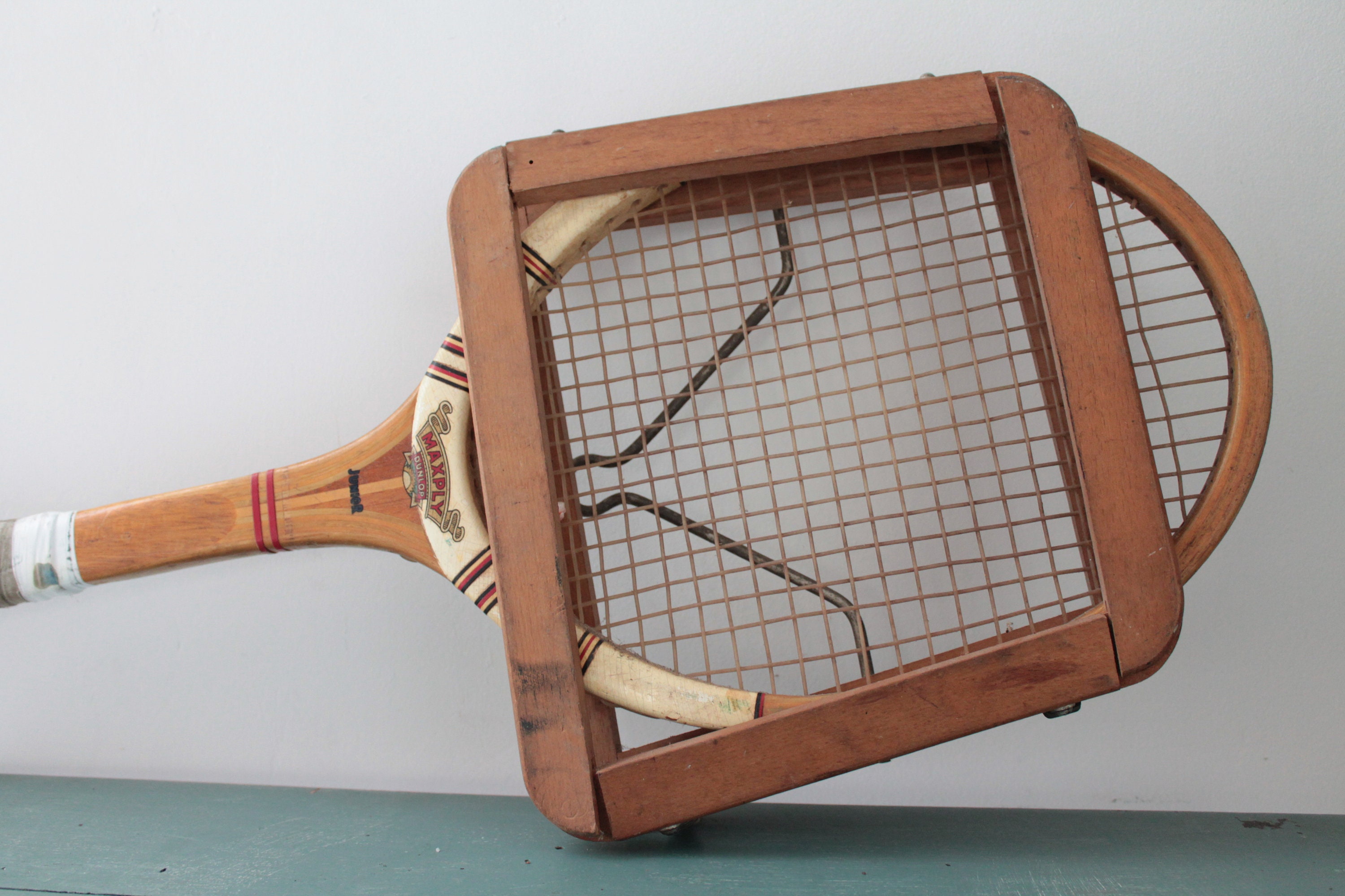 Lot - A Vintage Dunlop Pastime Tennis Racket & Press