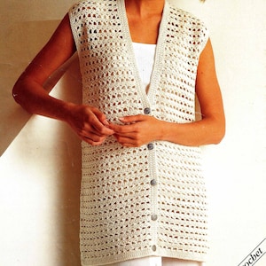 May include: A crocheted sleeveless vest with a button fastening. The vest is made with white yarn and has a delicate openwork pattern.