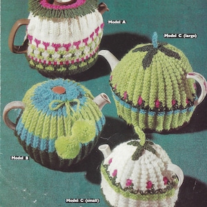 May include: Four knitted teapot cozy patterns, labeled Model A, Model B, Model C (large), and Model C (small). The cozies are in various colors and patterns, including white, green, pink, blue, and brown.