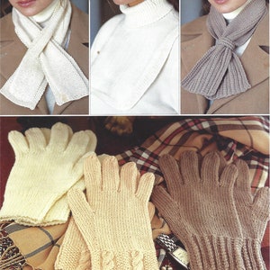 May include: Three different knitted scarves and two pairs of knitted gloves. The scarves are white, beige, and brown. The gloves are white and beige.