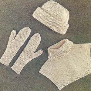 May include: A set of knitted winter accessories in a light beige colour, including a hat, mittens, and a cowl neck.