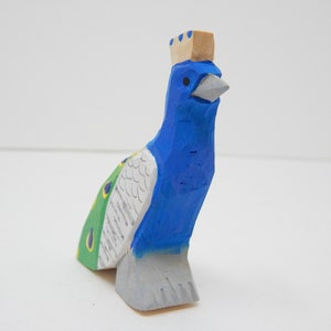 peacock wood figurine