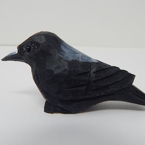 black crow figurine