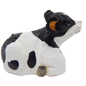 wood cow figure