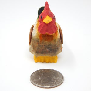 chicken wood figurine