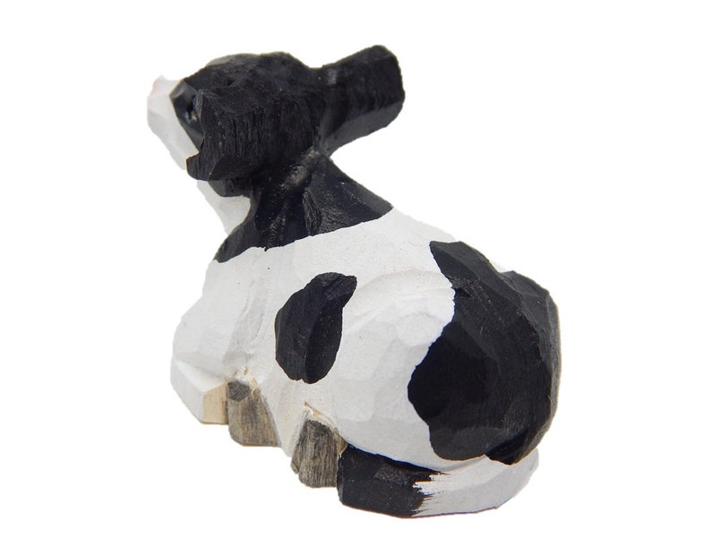 spotted cow figurine
