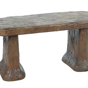May include: A brown bench with a textured, wood-like appearance. The bench has a rectangular seat and two tree trunk-shaped legs. The bench is approximately 48 inches long.