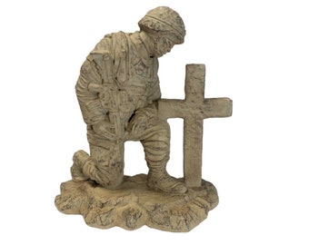 Solid Rock Stoneworks kneeling soldier at cross