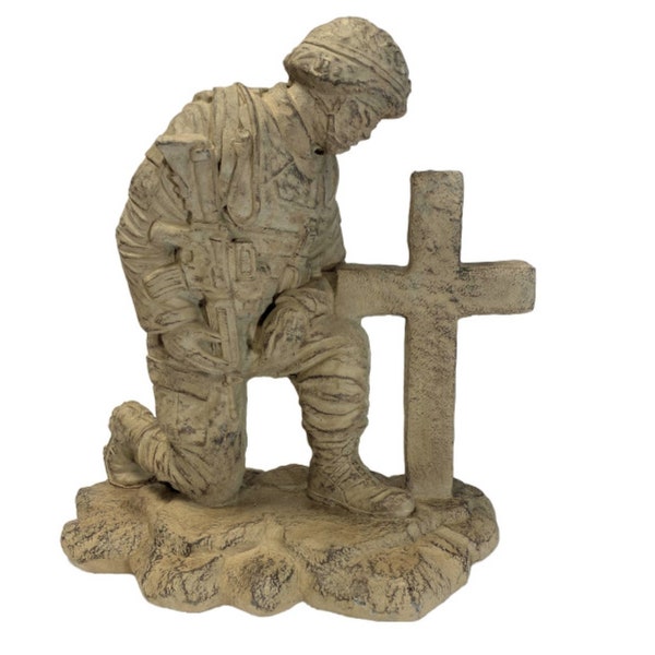 Solid Rock Stoneworks kneeling soldier at cross